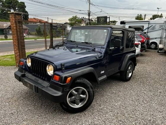 JEEP WRANGLER 4.0 SPORT 4X4 TETO LONA 6I 12V GASOLINA 2P MANUAL